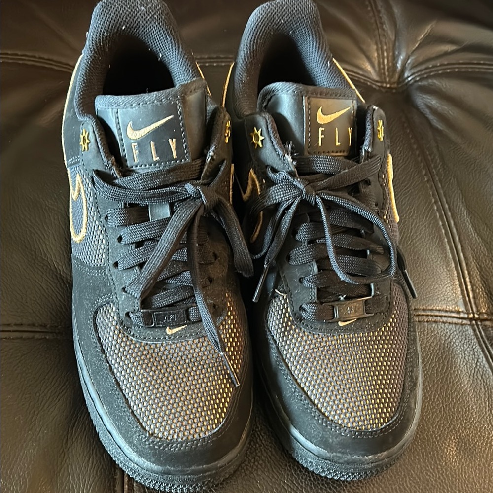 Nike Air Force 1 Black and Gold Sneakers